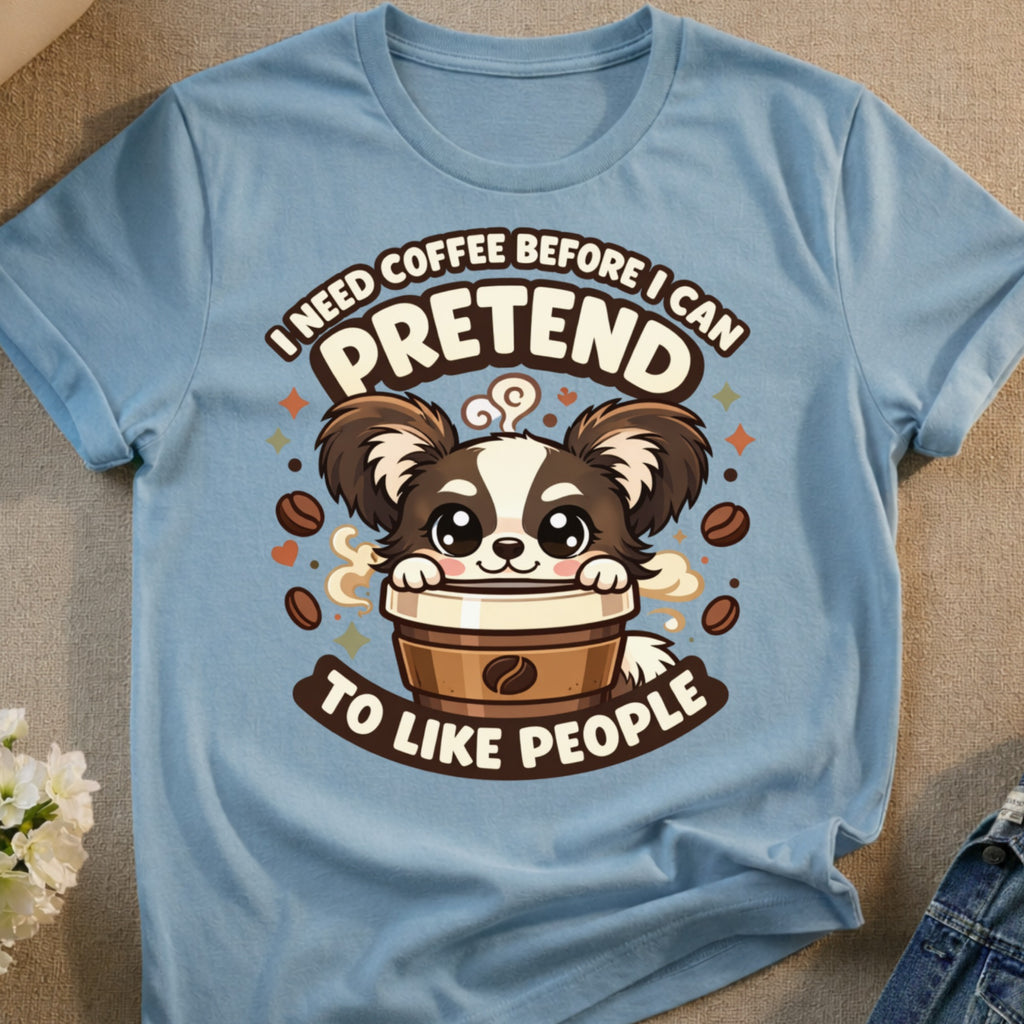 Cute cartoon dog in coffee cup saying "I need coffee before I can pretend to like people."