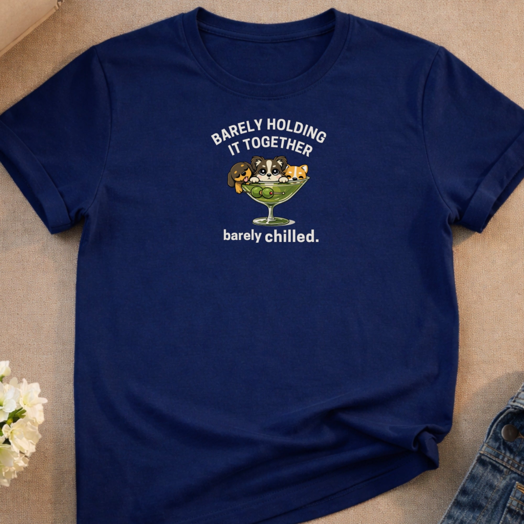 Dark blue t-shirt with "Barely Holding It Together" and "barely chilled" text and cartoon animals.