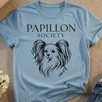 Light blue t-shirt with "Papillon Society" text and a line art drawing of a Papillon dog.