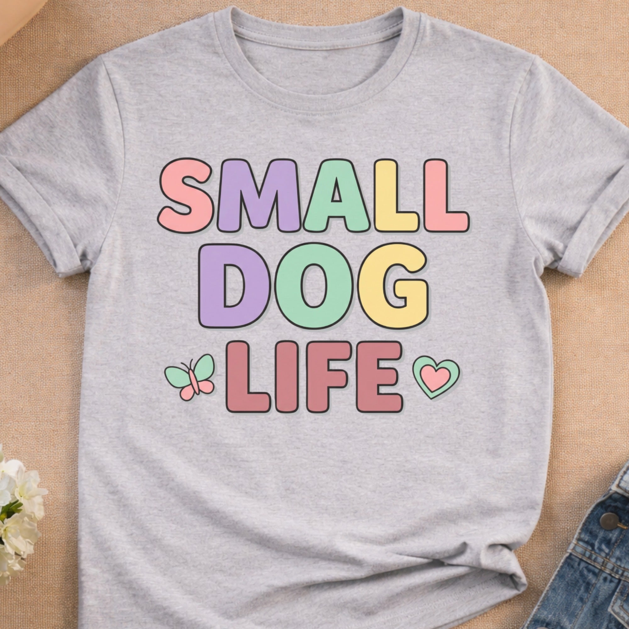 Gray t-shirt with pastel "SMALL DOG LIFE" text and heart accents.