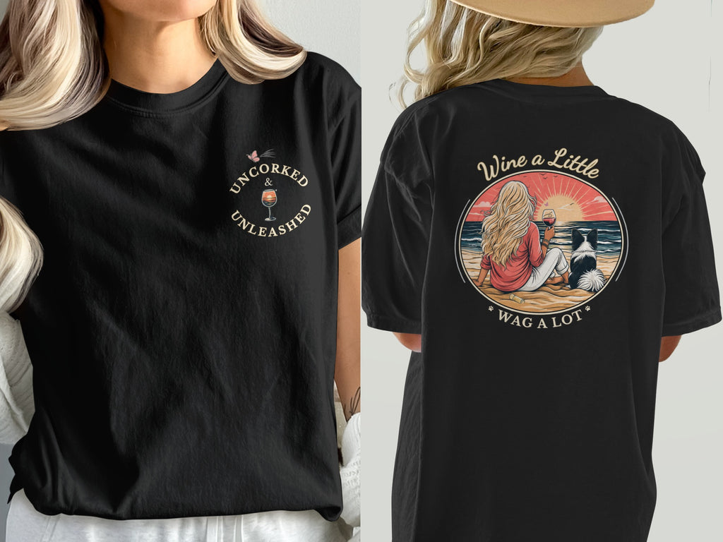 Black t-shirt with "Uncorked & Unleashed" on front and beach scene on back.