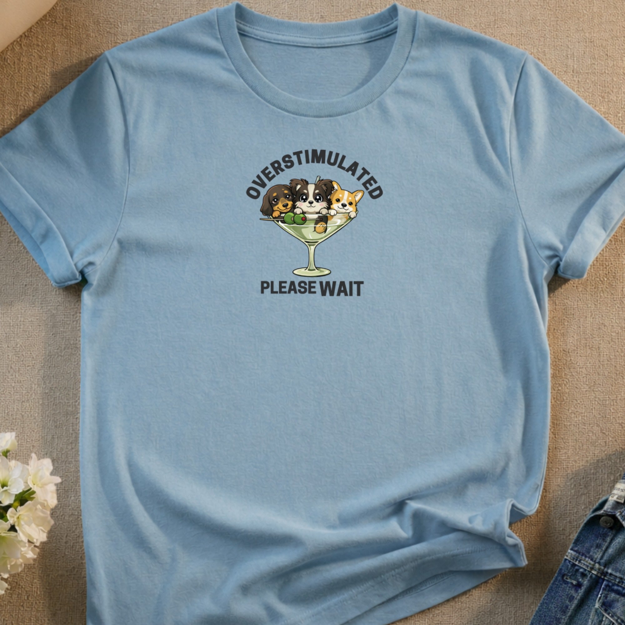 Blue t-shirt with "OVERSTIMULATED PLEASE WAIT" and puppies in a martini glass.