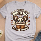 Cute cartoon dog wearing a coffee cup hat with text "I need coffee before I can pretend to like people".