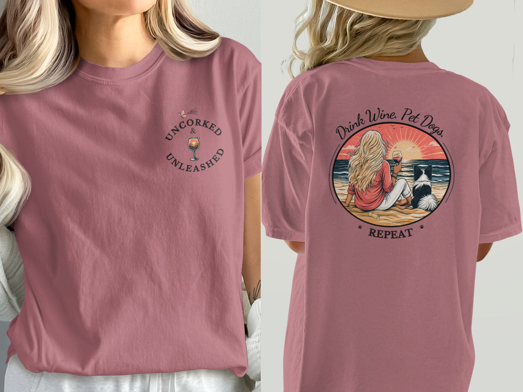 Woman wearing t-shirt with wine and dog graphic on back.