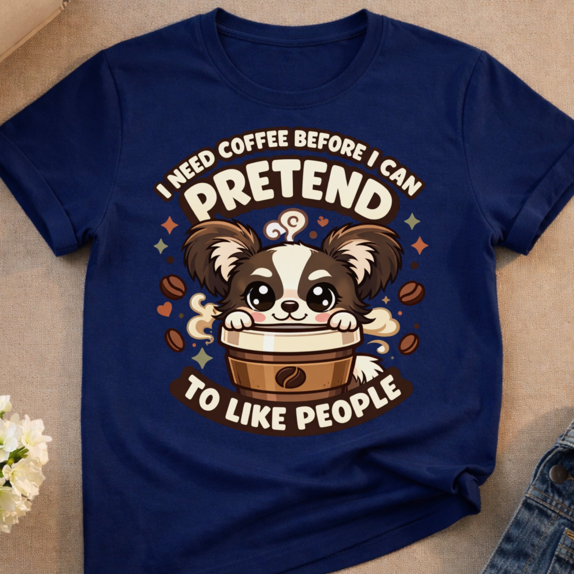 Navy t-shirt with cartoon dog in coffee cup saying "I need coffee before I can pretend to like people."
