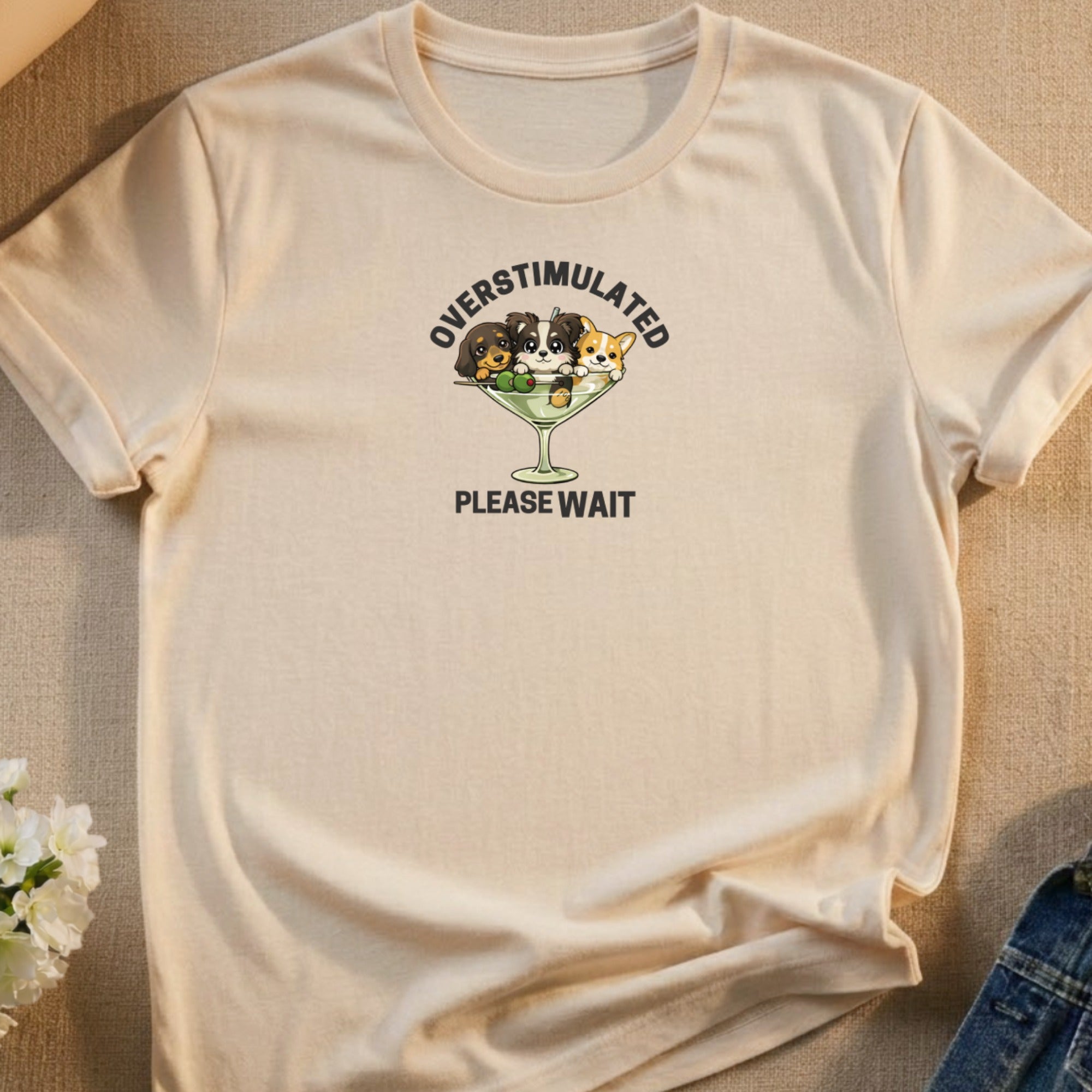 T-shirt with three cartoon puppies in a martini glass, reading "OVERSTIMULATED PLEASE WAIT".