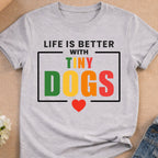 Life is better with tiny dogs text and heart graphic on t-shirt.